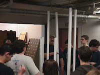 A mentor demonstrating the pliability of the goal tubing