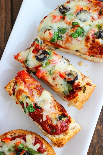 French Bread Pizzas – Just like the frozen kind, but 10x more delicious and wholesome! | thecomfortofcooking.com