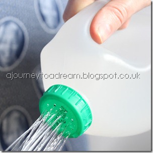 milk bottle watering can