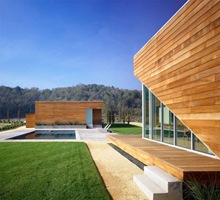 Residencia Summerhill con Fachadas modernas revestidas en Madera