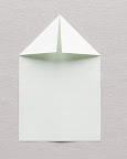Mark the center crease by folding the long edges together, face in; then unfold the paper and lay it face down, with the airplane pointing up. Fold top corners down to meet the middle crease. Mark the center crease by folding the long edges together, face in; then unfold the paper and lay it face down, with the airplane pointing up. Fold top corners down to meet the middle crease.
