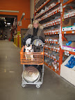 There is a rule that dogs must travel through the store in a cart.  We obliged happily - it was such a great vantage point.  Martha got new hoses for the greenhouses and some flat pans for the geese feed.