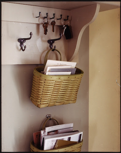 Hooks are another must in an entry.  Great for jackets, keys and pet leashes.  Hang a few baskets on them too for sorting mail.