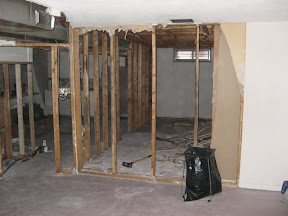 look at the size of our basement without the wall I hate