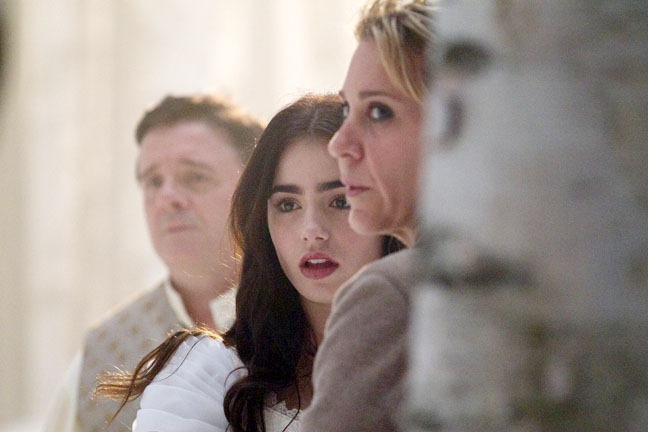 Nathan Lane and makeup department head Annick Chartier frame Lily Collins, "Snow White," September 13, 2011