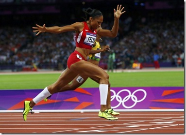 allyson-felix-of-the-u-s-3rd-l-runs-on-her-way-to-winning-the-womens-200m-final-during-the-london-2012-olympic-games-at-the-olympic-stadium-august-8-2012