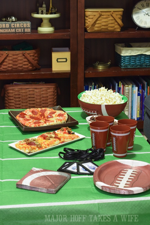 Football video game party. Looking for a fun party for your teenage boy? Why not throw a Football video game party? Easy ideas for how to entertain kiddos during the Big Game. Features DiGiorno pizza, personalized football cups, free printable lanyards, and an incredible recipe for football shaped ice cream sandwiches! #GameTimeMVP #CollectiveBias #ad Football video game party. Looking for a fun party for your teenage boy? Why not throw a Football video game party? Easy ideas for how to entertain kiddos during the Big Game. Features DiGiorno pizza, personalized football cups, free printable lanyards, and an incredible recipe for football shaped ice cream sandwiches! #GameTimeMVP #CollectiveBias #ad