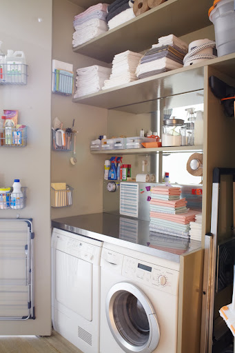 Even utilitarian spaces can benefit from mirror.  The dark closet where my washer and dryer are located is now a bright workspace.