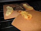 We used our pizza stone to bake the naan and our new pizza peel was great for sliding it in and out.
