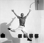 c0 Truman Capote jumps for joy in this photo by Cecil Beaton