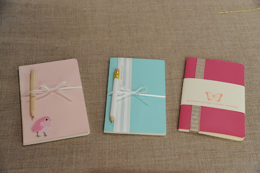 Notebook favors inspired by Melinda Meinke and Jesse Johnson’s winter 2006 wedding. The center notebook is a cute journal from our Martha Home Office with Avery collection (www.staples.com/Journals-Journals-Notebooks/cat_CL166425), and the others are Moleskine “Volant” notebooks from Barnes & Noble (www.barnesandnoble.com).
