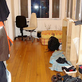 The sunroom with the floor re-finished (and with some random chairs and junk) - I still have to put in the trim and install the cabinets you can see on the right The sunroom with the floor re-finished (and with some random chairs and junk) - I still have to put in the trim and install the cabinets you can see on the right