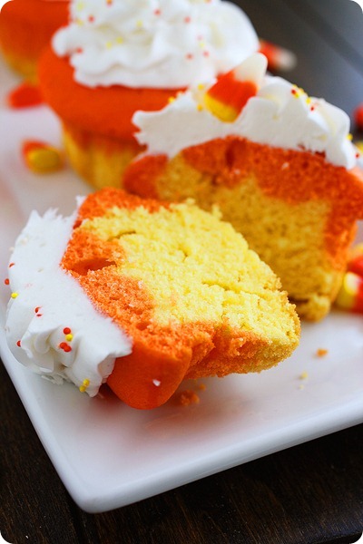 Candy Corn Cupcakes – Easy & perfect for a Halloween party or any fun reason to celebrate fall! | thecomfortofcooking.com