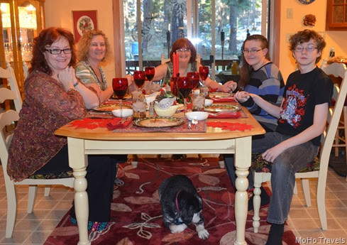 Christmas dinner table with Mo taking hte photo for us