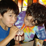 The boys enjoying a milkshake at Cafe Slavia - one of Prague's grand old cafes