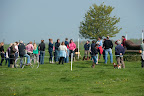 Members of the public being shown around the course