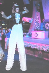 Disney trip parade girl on stilts