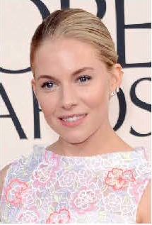 To complement Sienna Miller's airy frock, makeup artist Pati Dubroff went with a natural, effortless look. Navy blue eyeliner, layered with Chanel's Intense Eye Penil in Graphite, defined her eyes. Light, fluid foundation and Soleil Tan de Chanel Bronzing Makeup base helped impart a dewy, sunny glow. Photo courtesy of Chanel.