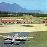 DF Malan Airport - clearly before it became an international one - so where did that US Air Force Skymaster (?) come from? The plane to the right is probably a British Viscount.