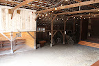 The inside. Because the place is still new, the to-do list isn't completely checked off. Come the spring, this will have a concrete floor, bird-proofed ceiling, and a vintage bar. There's a great stage on the right for a band or sweetheart table, too. The inside. Because the place is still new, the to-do list isn't completely checked off. Come the spring, this will have a concrete floor, bird-proofed ceiling, and a vintage bar. There's a great stage on the right for a band or sweetheart table, too.