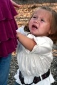 [668044-little-girl-crying-holding-onto-and-looking-up-at-her-mother%255B2%255D.jpg]
