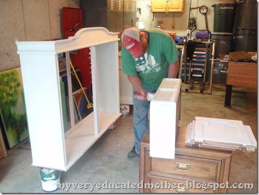 Hutch being painted painting, hutch, recycled, remade