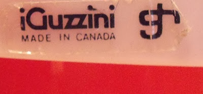 Guzzini orange and white lamp label