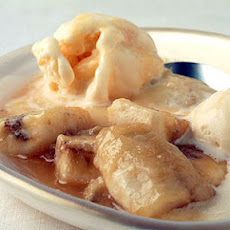 Caribbean Bananas Flambé with Pineapple Curd over Frozen Yogurt