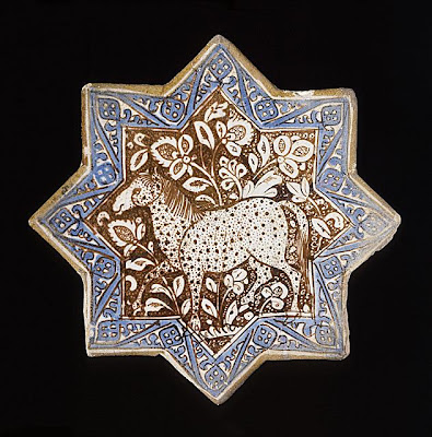 Star Tile The Legacy of Genghis Khan: Courtly Art and Culture in Western Asia, 1256-1353 | Origin: Iran, Kashan | Period: circa 1300 | Collection: The Nasli M. Heeramaneck Collection, gift of Joan Palevsky (M.73.5.377) | Type: Ceramic; Architectural element, Fritware, overglaze luster-painted, with cobalt blue, Diameter: 8 1/4 in. (20.96 cm)