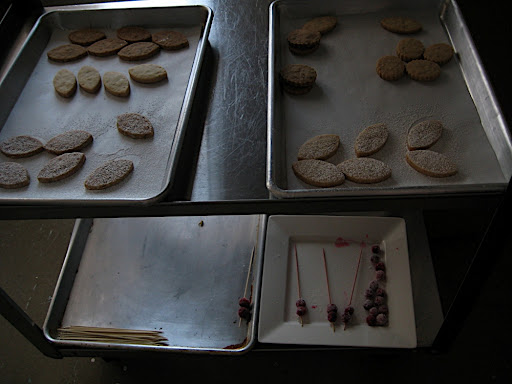 Kristina's cart of cookies and cranberry garnishes.