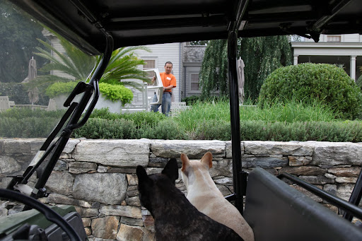 Oh good, Chhiring!  We see that you're already putting the outdoor furniture away.  We wouldn't want it blowing around out here in those potentially strong winds.  The furniture could hit the house and break the windows!