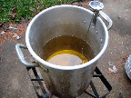 The turkey cooks at 350 degrees, but it is a good idea to heat it to about 375 as once the turkey is added, the oil temperature will drop.