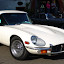 Jaguar, EV12 1971 Coupe. Background earliest E-Type from Philip Porter. Both with Headlight-Covers Foto: Prof.W. Schön Jaguar XK-E, with Head-Light-Cover Kit. The Head-Lamp-Cover Conversion Kit made by designer Stefan Wahl in the tradition of Malcolm Sayer. / Jaguar E-Type mit Scheinwerferabdeckungen, designed und hergestellt von Designer Stefan Wahl in der Tradition von Malcolm Sayer.