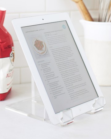 Try an almost-invisible, inexpensive acrylic plate stand to prop up your tablet on your desk or kitchen counter, keeping it easily accessible with minimal fuss. Try an almost-invisible, inexpensive acrylic plate stand to prop up your tablet on your desk or kitchen counter, keeping it easily accessible with minimal fuss.