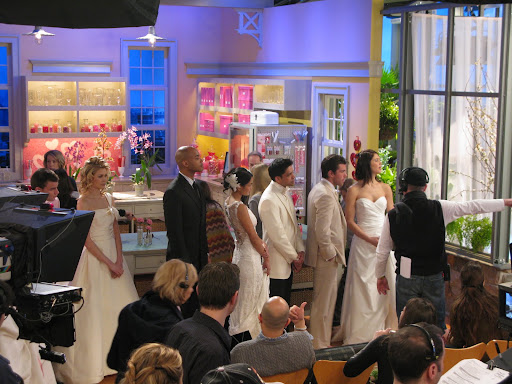 The models in their beautiful and handsome fashions await their cues. The models in their beautiful and handsome fashions await their cues.