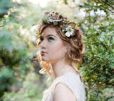 The positioning of the flowers in her hair evokes a sense of old-world innocence