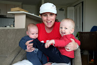 An excited Loui holding Adam and Oscar