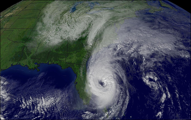This satellite image shows the storm and the intense baroclinic trough over the eastern U.S. that Hurricane Wilma interacted with, 25 October 2005. Photo: NOAA / Satellite and Information Service
