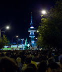 Broadcast tower, thousands of protesters surrounding the Expo into the night.
