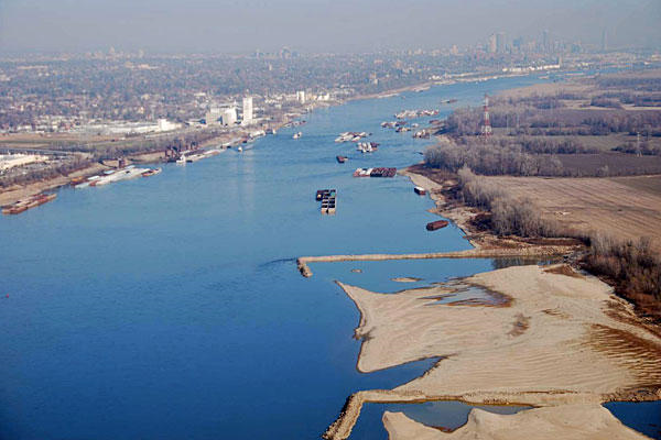 Months of drought have exposed man-made dikes and large sandbars along the shoreline of the Mississippi River south of St. Louis. Colby Buchanan / United States Coast Guard / AP