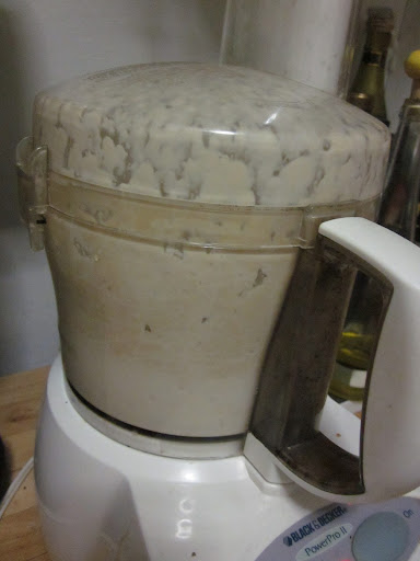 Process on high speed for about a minute until there are no chunks, then gradually add the rest of the water from the jar until it's well blended and, ahem, milky.