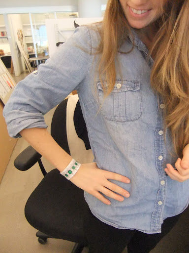 Laura Kaesshaefer, editorial assistant in crafts, shows off this emerald and diamond bracelet.