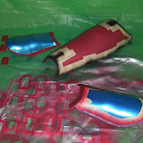 Shoulder strap "tabs", inner shoulder armor, rear calf