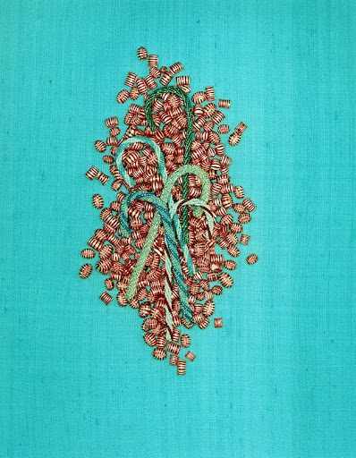 These candy canes are made from strings of beads -- I love glittered decorations!