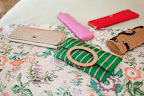 all of the bridesmaids carried kate spade clutches - not down the aisle, but for the rest of the day.