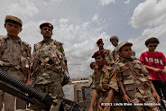 Real soldiers and toy soldiers. Friday prayer on 60 Meter Rd, Sana'a, Yemen جمعة الوفاء لأبين  في شارع الستين بصنعاء