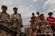 Real soldiers and toy soldiers. Friday prayer on 60 Meter Rd, Sana'a, Yemen جمعة الوفاء لأبين  في شارع الستين بصنعاء