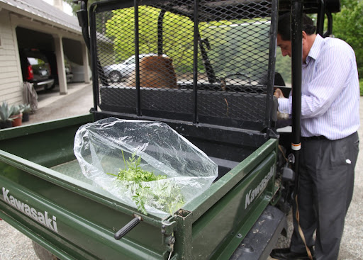 Come on, Francesca!  Carlos is loading us up in the Kawasaki so we can take a ride down to the chicken coops!
