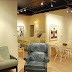 The Loft's den expands into the full kitchen and dining area.