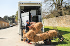 Michael Jung unloading straw and hay
